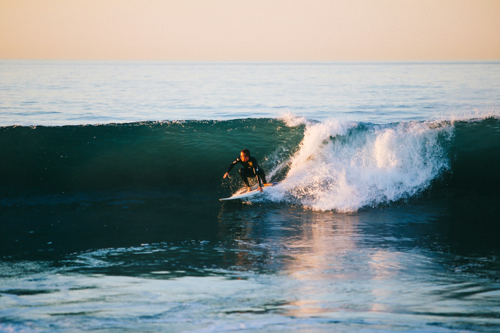 Surfer riding a wave on the Mornington Peninsula
